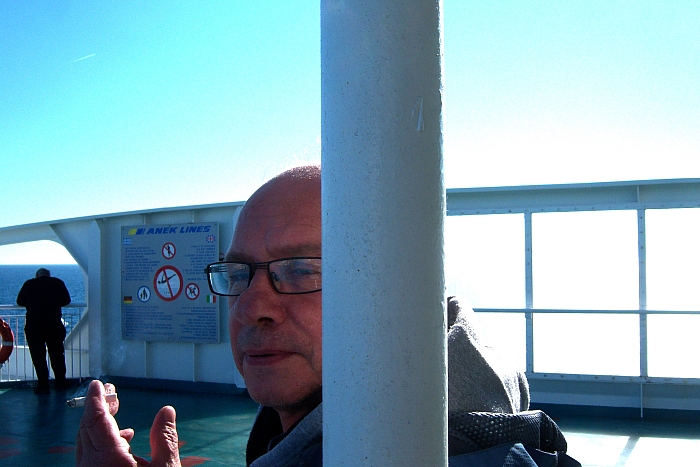 100_2092 small ancona boat mikko smoking.jpg - 230773 Bytes